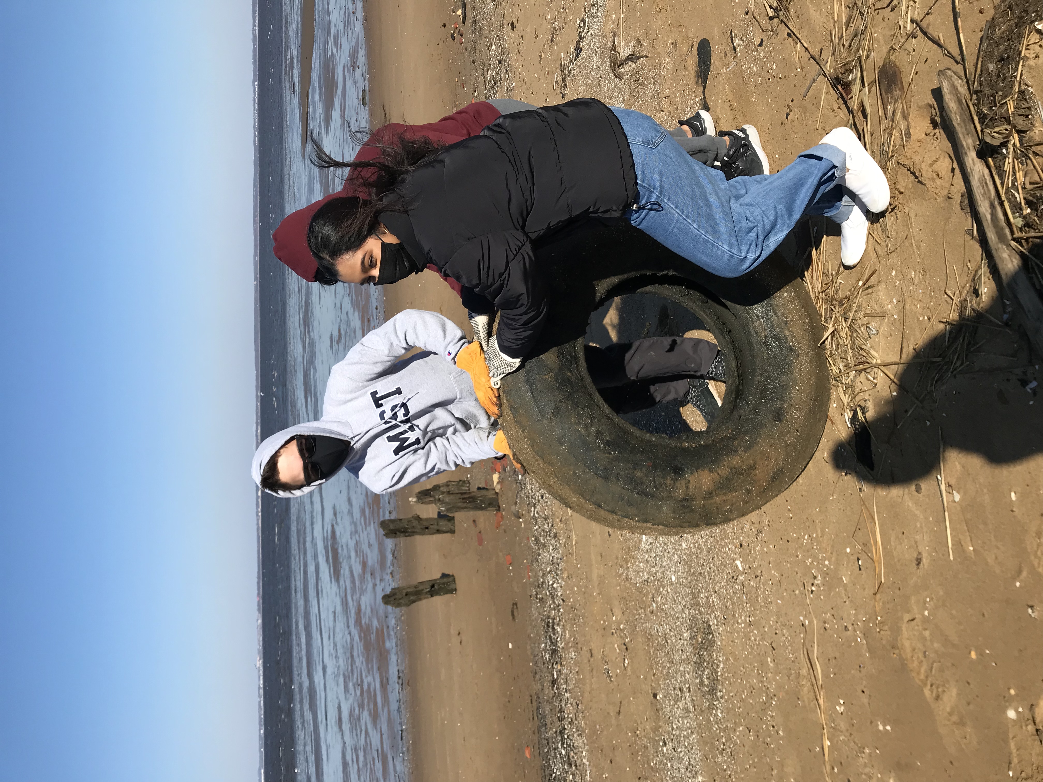 Students practice waterway stewardship at a beach cleanup in Keyport, New Jersey, USA. February 2022